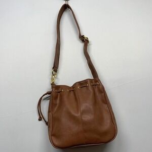 X.S.R.E Pebbled Leather Bucket Bag Crossbody